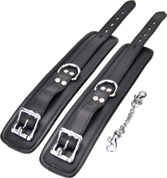 Black leather Manbound Bound Leather Wrist Restraints with their chain
