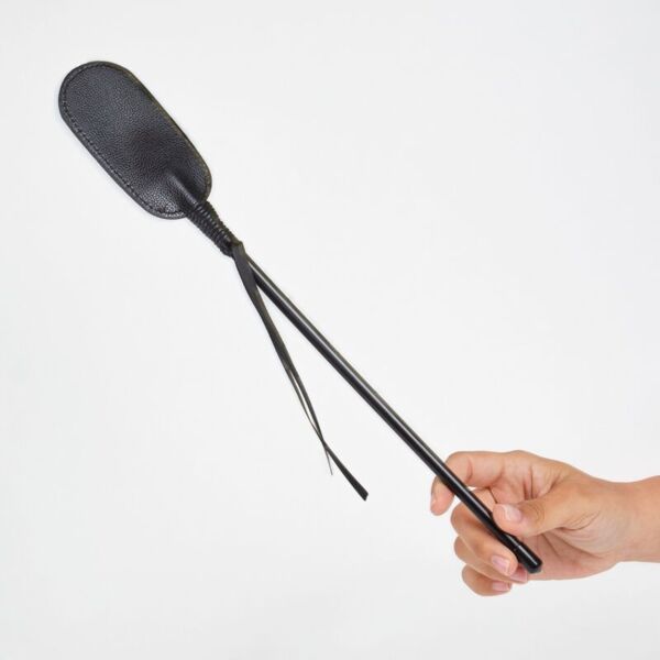 Secret Play Black Oval riding crop, with a black shaft and an oval synthetic leather slapper
