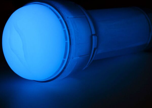 Kiiroo FeelGlow masturbator with a translucent sleeve, vaginal-shaped opening and clear casing
